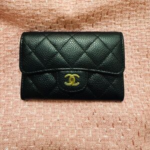 CHANEL Black Quilted Wallet with Gold Logo